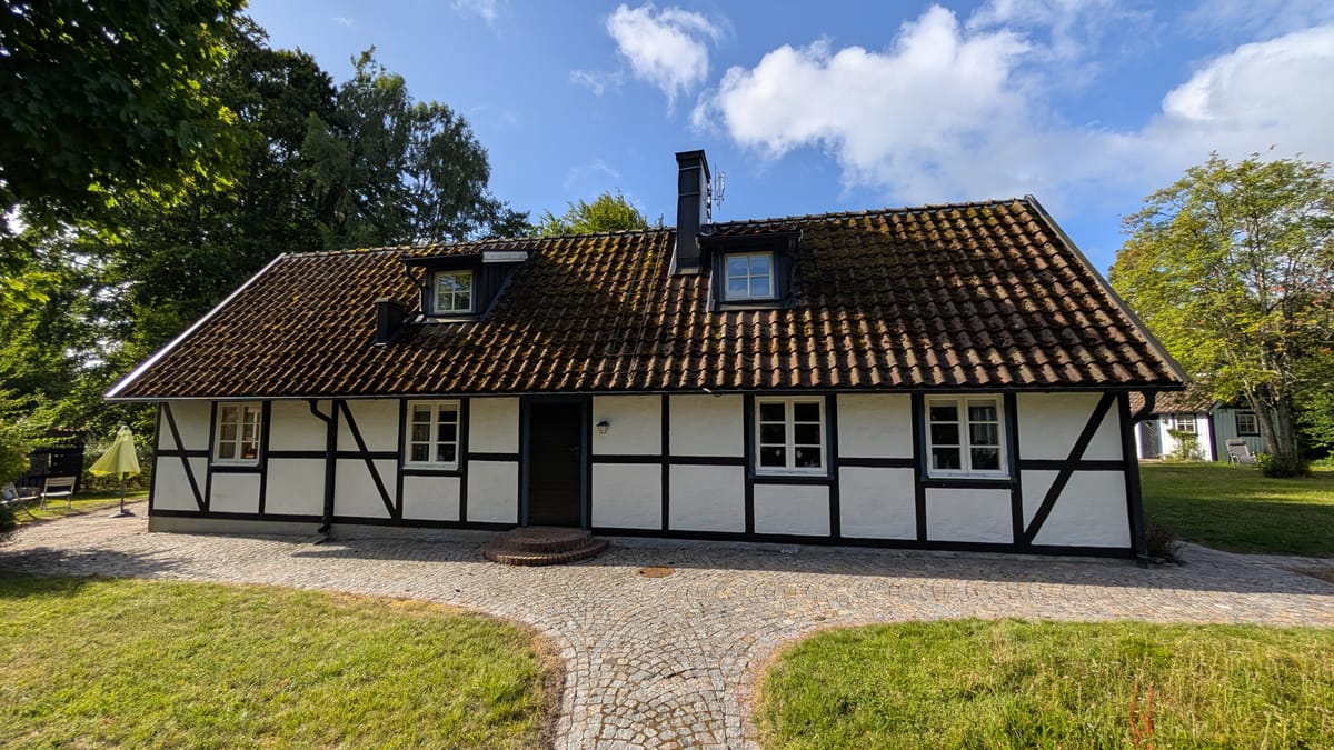 Taktvätt Kristianstad - korsvirkeshus med tegeltak
